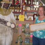 Wes and Sue showcase the honey produced on the farm.